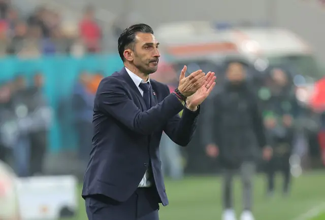 Elias Charalambous, Head Coach of FCSB, applauds