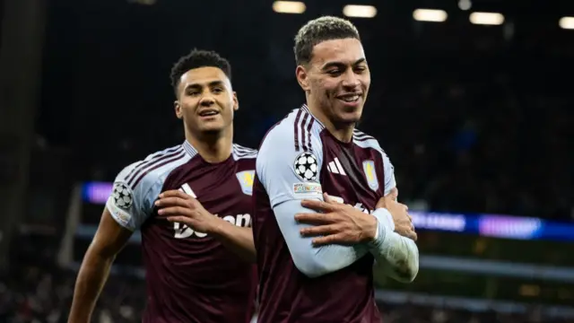 Aston Villa midfielder Morgan Rogers celebrates after scoring his hat-trick goal.