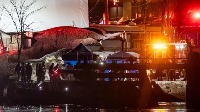 Rescuers on a boat