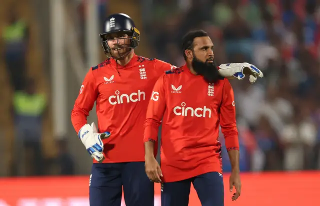 Adil Rashid and Phil Salt celebrate a wicket