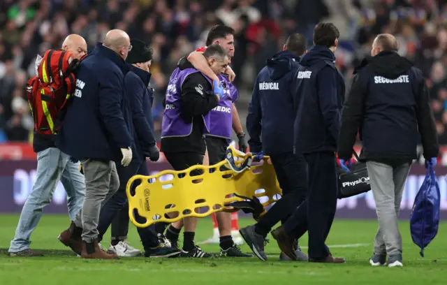 Wales centre Owen Watkin limps off