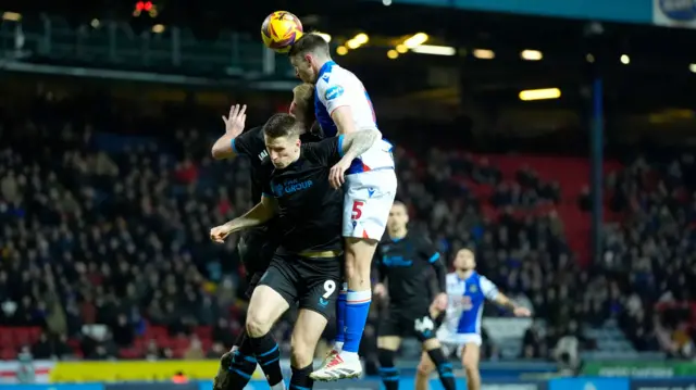 Blackburn Rovers' Dominic Hyam collides with Preston's Jack Whatmough