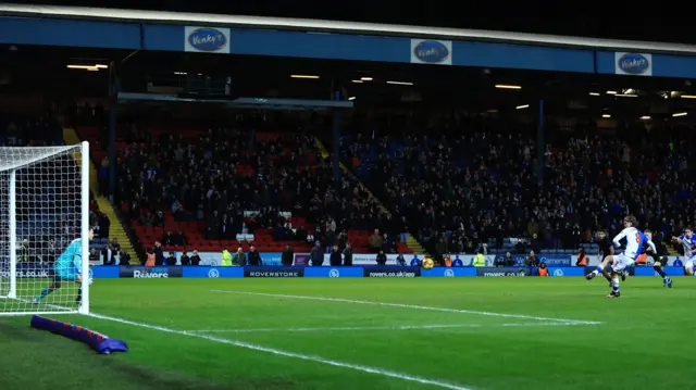 Todd Cantwell of Blackburn Rovers scores a goal from the penalty spot to make it 2-0