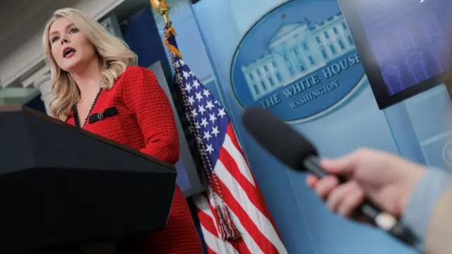 Karoline Leavitt speaking at a White House news briefing