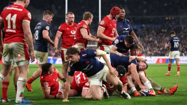 Julien Marchand of France stretches to score the 5th France try