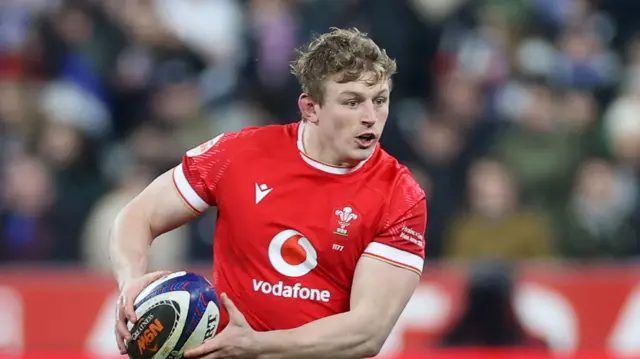 Jac Morgan carries the ball for Wales