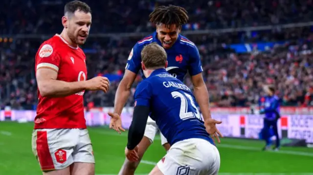 Emilien Gailleton of France celebrates after scoring his team's sixth try