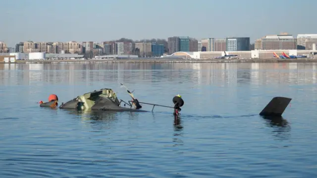 A handout image from the US Coast Guard showing the wreckage of the US army Black Hawk helicopter in the Potomac River