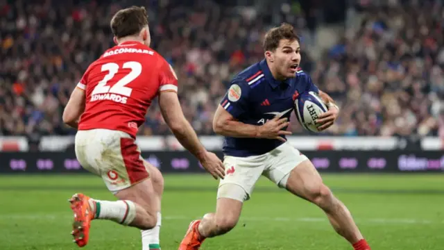 Antoine Dupont carries for France