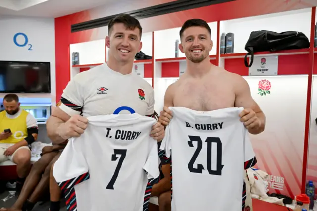 Tom Curry and Ben Curry with their England shirts after defeat by New Zealand in November