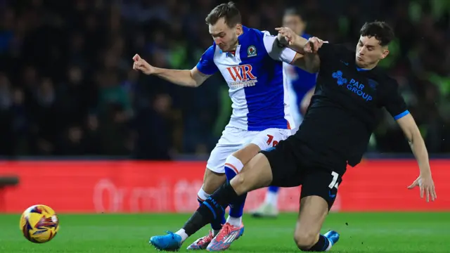 Jordan Storey of Preston North End and Ryan Hedges of Blackburn Rovers