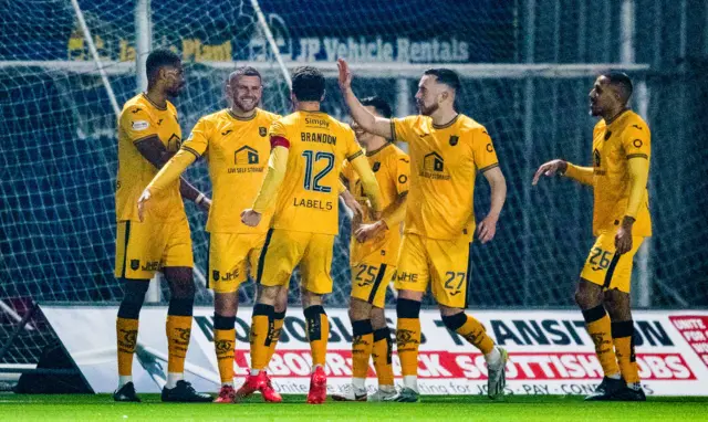 Livingston players celebrate