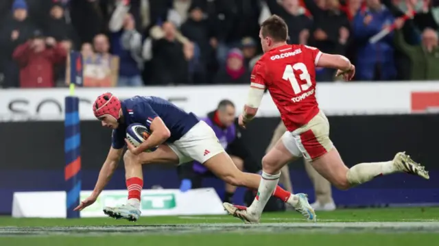 France wing Louis Bielle-Biarrey crosses for the second France try