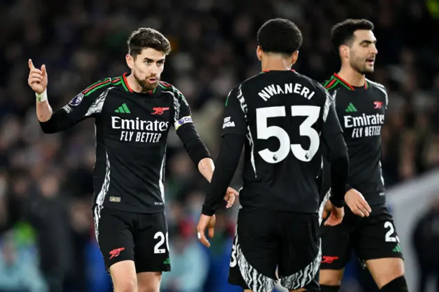 Jorginho speaks to Nwaneri during a stoppage in play