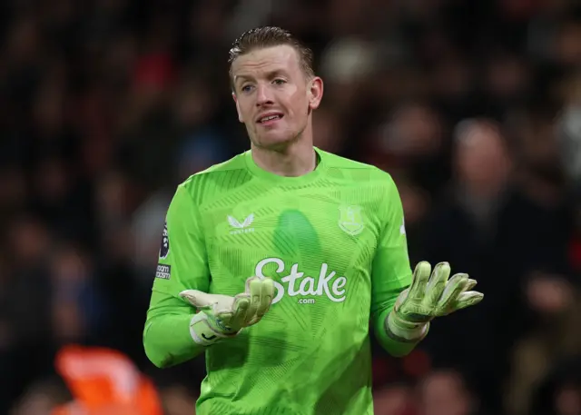 Pickford holds his hands up in disbelief