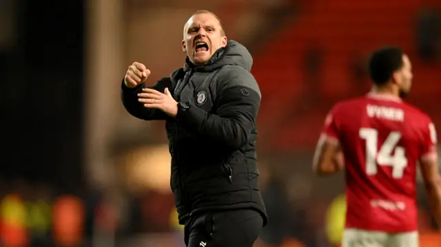 Bristol City head coach Liam Manning celebrates victory over Derby