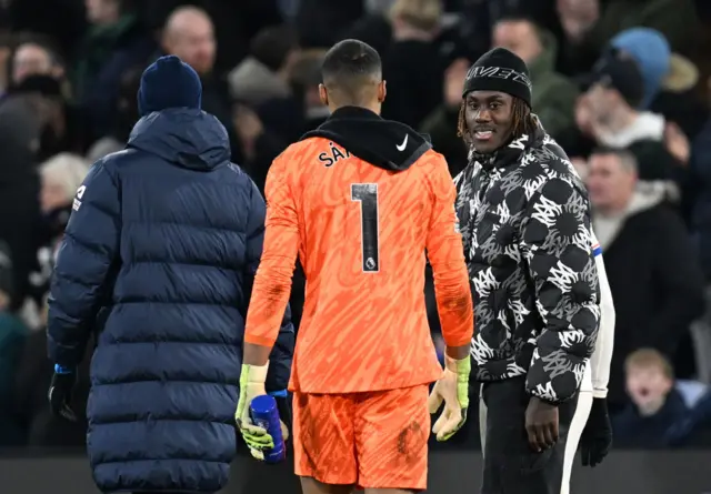 Trevoh Chalobah speaks to old teammate Robert Sanchez on the pitch at full time