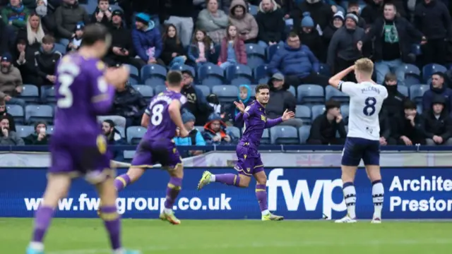 Ruben Rodrigues celebrates after opening the scoring at Preston