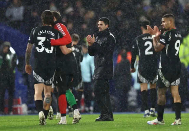 Arteta and his Arsenal players clap the away fans from the pitch at full time