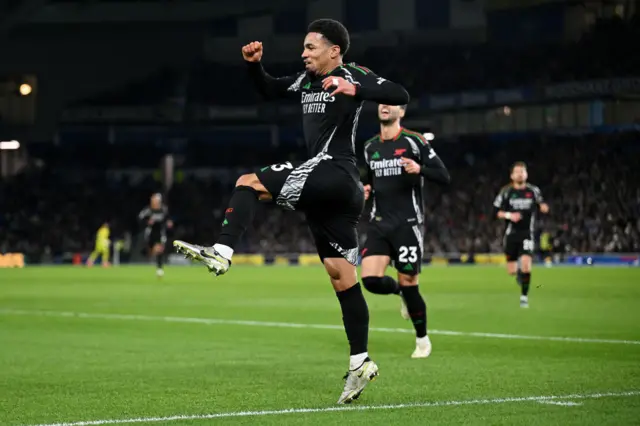 Nwaneri celebrates his goal by fist pumping and jumping into the air