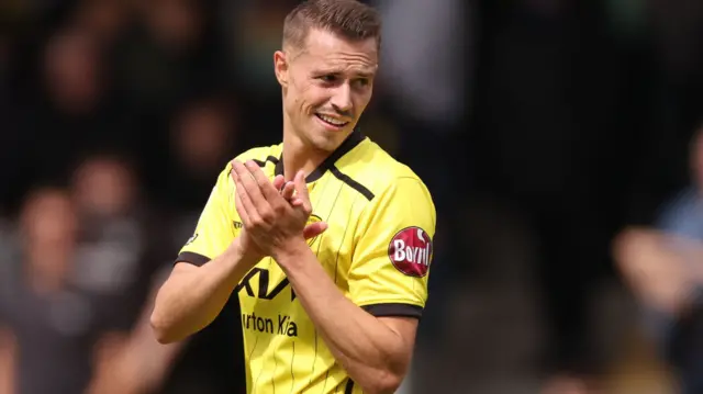 Billy Bodin applauds