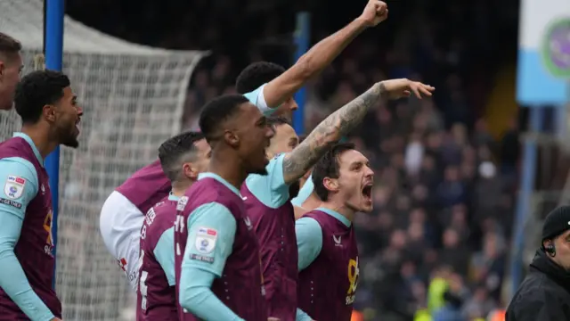 Burnley players celebrate Zian Flemming's goal against Blackburn