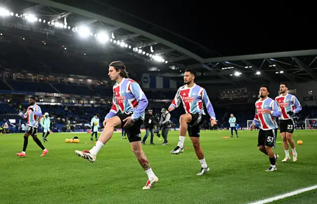 Arsenal players warm-up