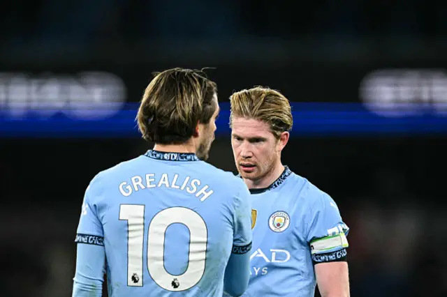 Kevin de Bruyne alongside Jack Grealish