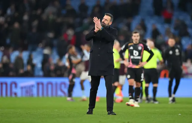 Ruud van Nistelrooy claps the away fans at full time