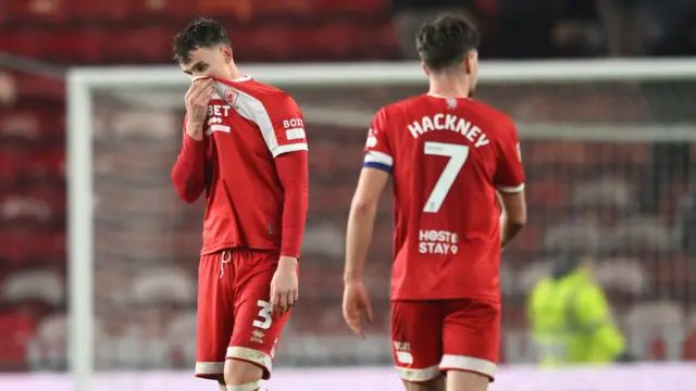 Middlesbrough's Rav van den Berg (left) is dejected after the full-time whistle