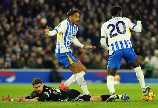 Jorginho is upended by Joao Pedro