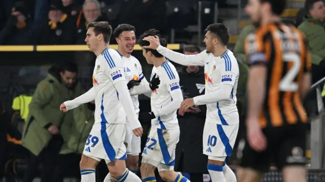 Joe Piroe pats Ao Tanaka on the head after his equaliser at Hull