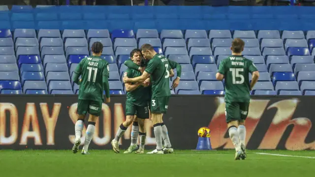 Goalscorer George Honeyman celebrates with his Millwall team-mates at Hillsborough