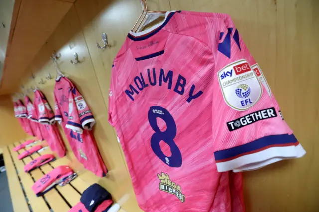 Jayson Molumby's shirt hanging in dressing room