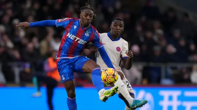 Crystal Palace's Eberechi Eze (left) and Chelsea's Moises Caicedo battle for the ball