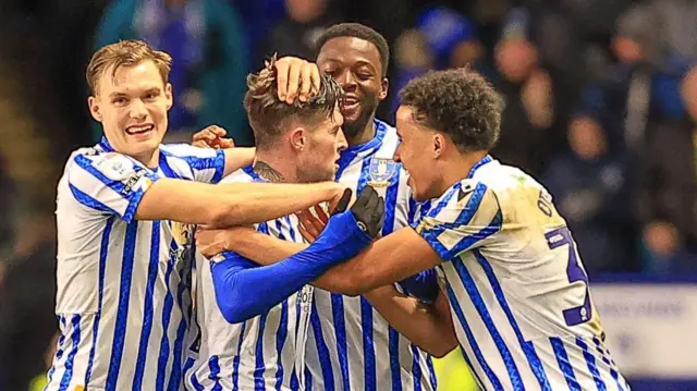 Josh Windass celebrating with team-mates