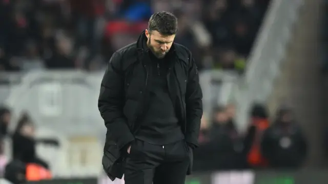 Middlesbrough manager Michael Carrick looks to the turf after Cardiff's equaliser