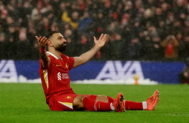 Salah celebrates his goal v United