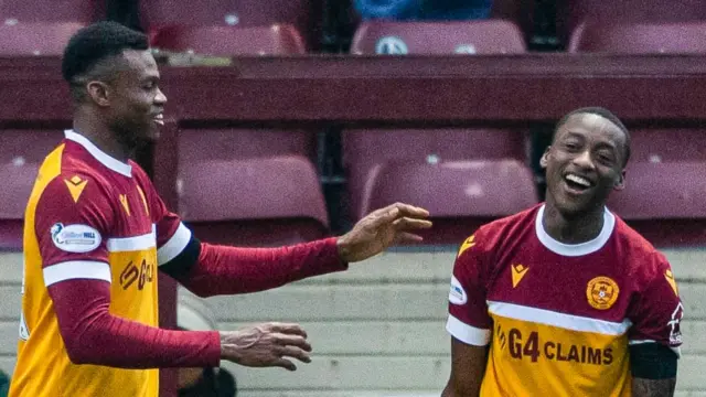 Motherwell's Moses Ebiye and Tawanda Maswanhise celebrate