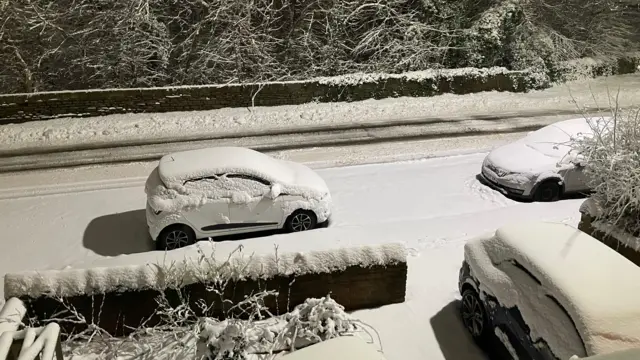 A snow covered residential street