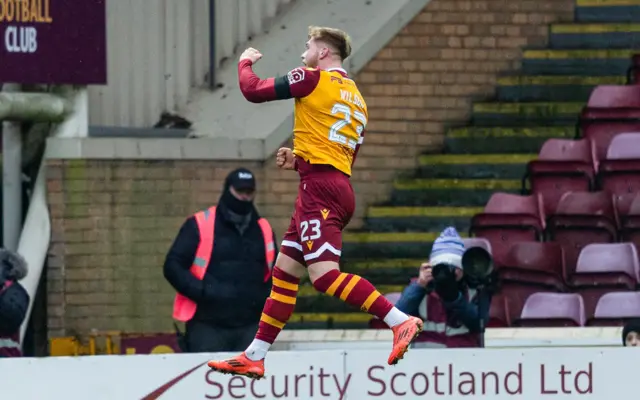 Ewan Wilson celebrates his goal