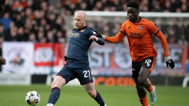 Hearts' Liam Boyce and Dundee United's Richard Odada