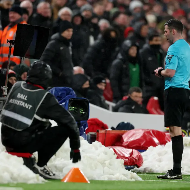 Oliver looks at the VAR screen