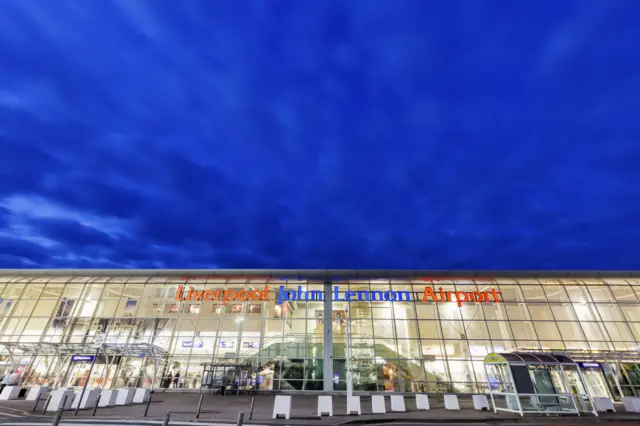 night sky over the airport terminal entrance