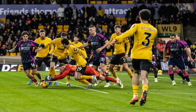 Ait-Nouri's cross is gathered by Matz Sels