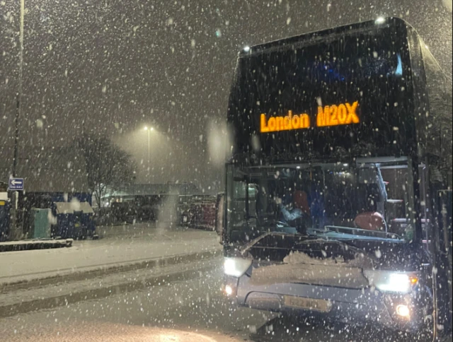 Nathan from High Leah, Cheshire, sent this image in of a Glasgow to London Victoria bus pulling in to pick up some passengers amid heavy snowfall