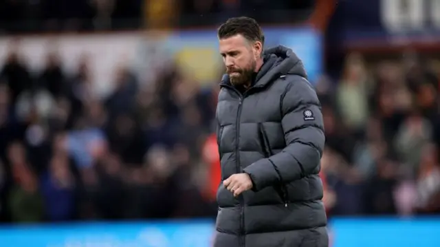 Rob Edwards looking dejected after Luton Town's 1-0 defeat to Norwich City