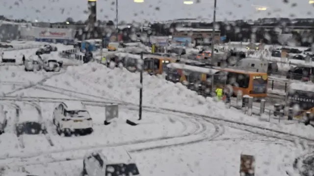 Leeds Bradford Airport car park covered in snow