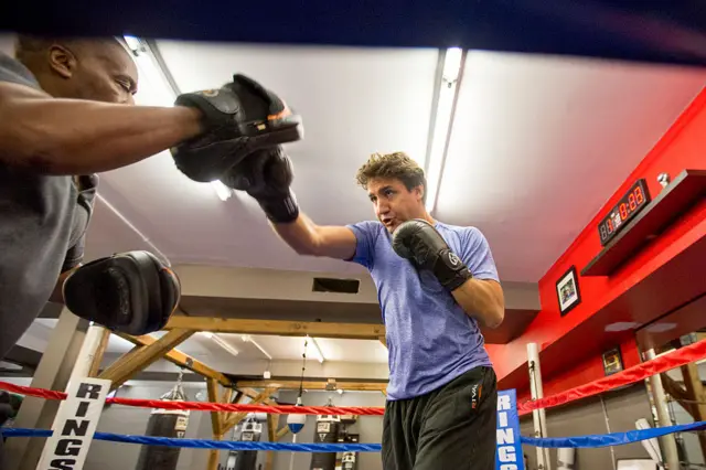 Paul Brown (left), owner of Paul Brown Boxfit, trains with Justin Trudeau. The Leader of the Liberal Party of Canada, Justin Trudeau, visits Paul Brown Boxfit boxing gym for a photo opportunity on August 6, 2015 in Toronto.