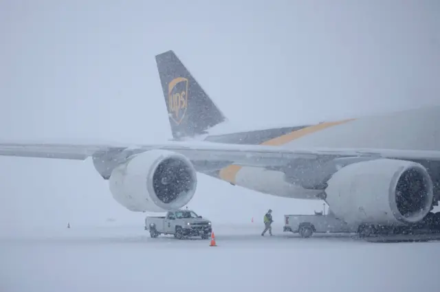 A UPS) plane sits parked in the snow at Louisville Muhammad Ali International Airport in Louisville, Kentucky. Photo: 5 January 2025